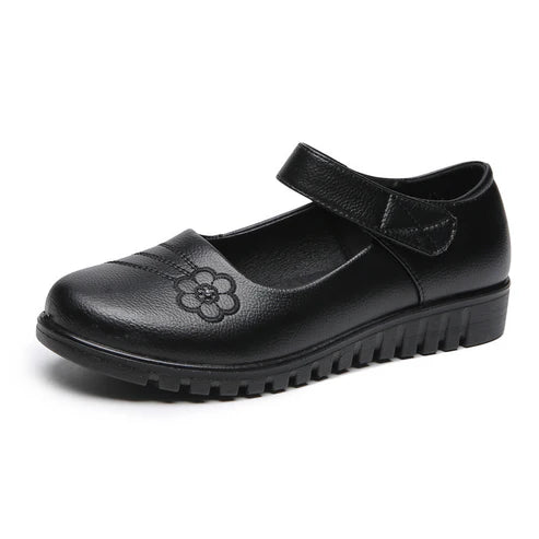 Zapatos de piel con velcro y pequeñas flores