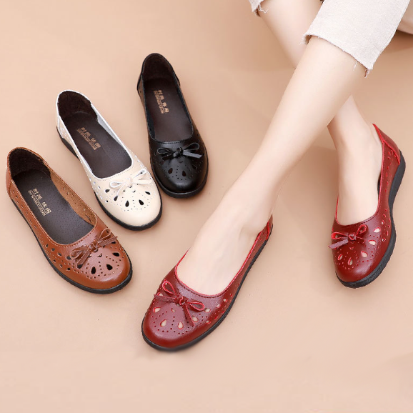 Exquisitos zapatos de piel con lazo