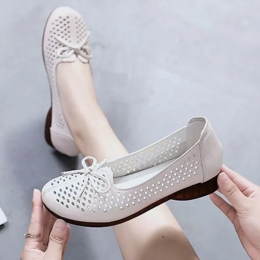 Zapatos huecos suaves y cómodos de suela plana