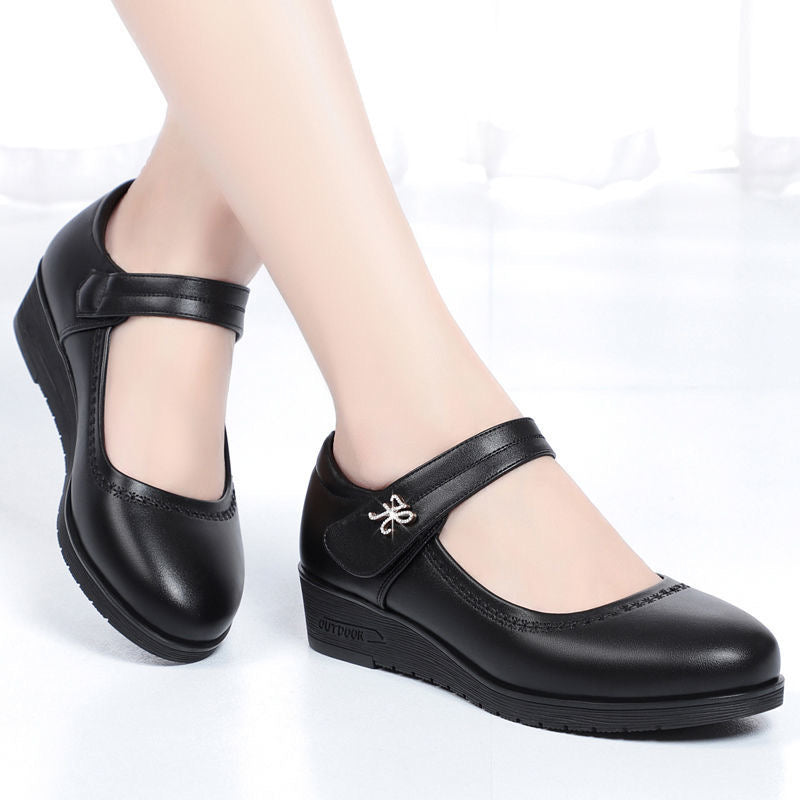 Zapatos de cuero de tacón medio con una sola tira