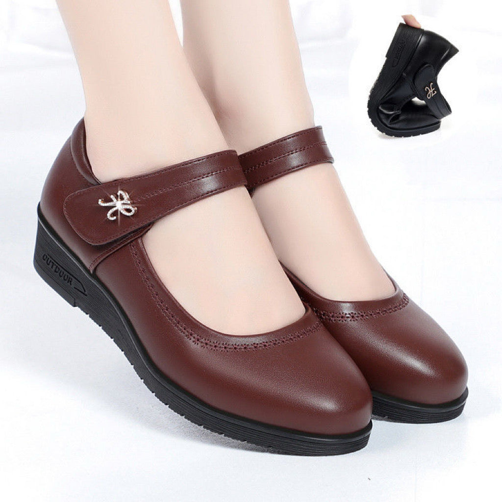 Zapatos de cuero de tacón medio con una sola tira