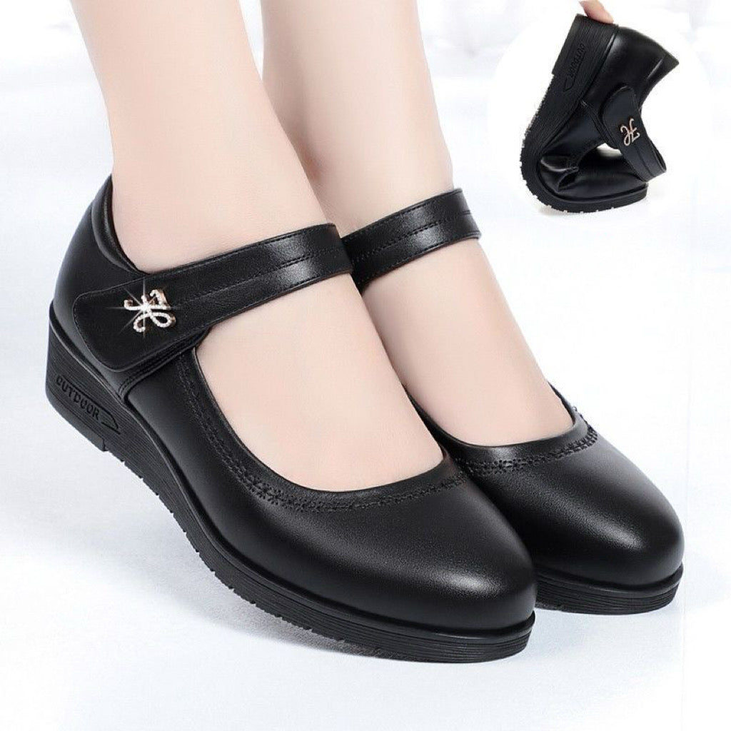 Zapatos de cuero de tacón medio con una sola tira