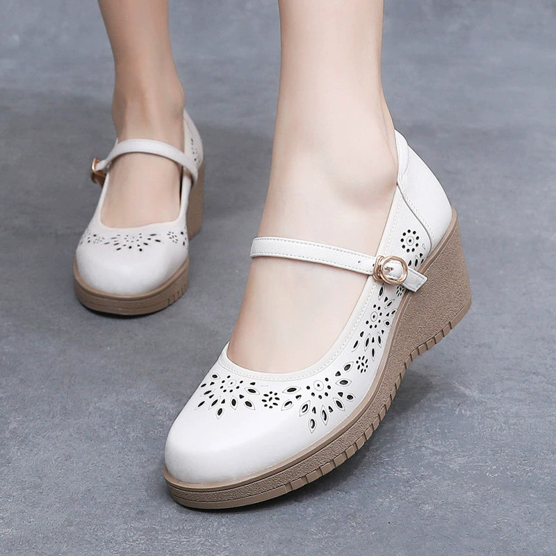 Nuevos zapatos de cuña con punta redonda