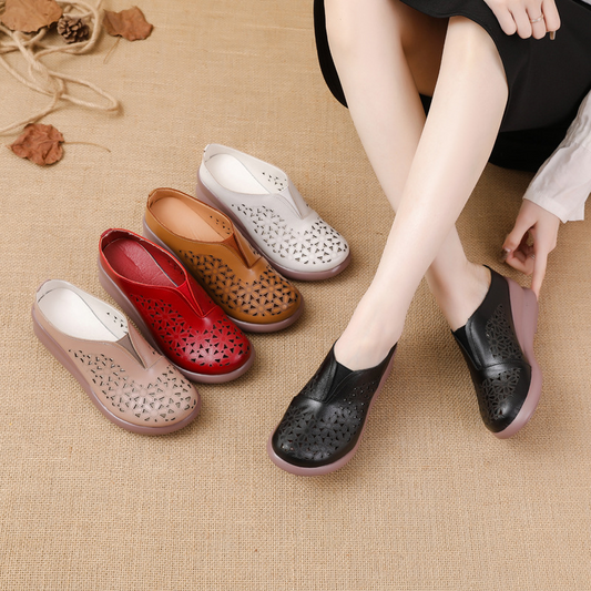 Zapatillas huecas de cuero con flores