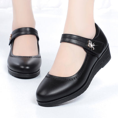 Zapatos de cuero de tacón medio con una sola tira