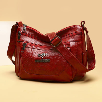 Bolso bandolera de piel suave estampada