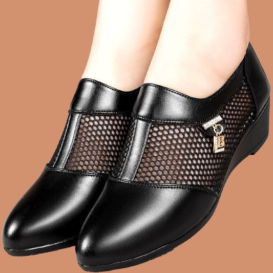 Zapatos de piel con cuña de malla