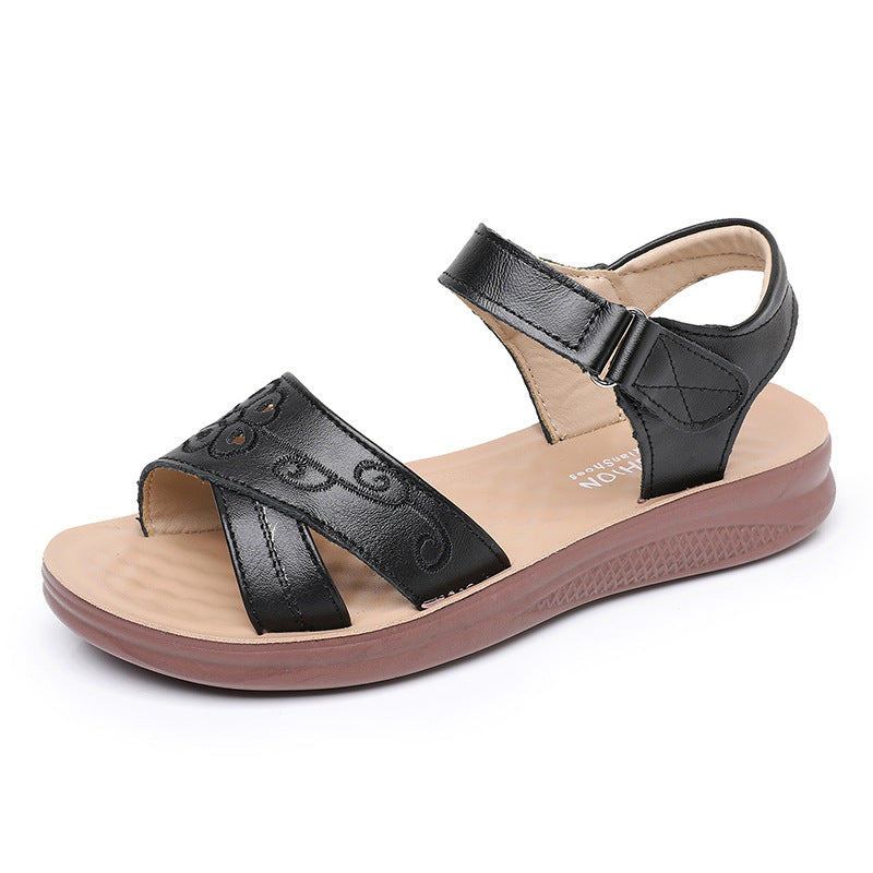 Sandalias planas de cuero para mujer