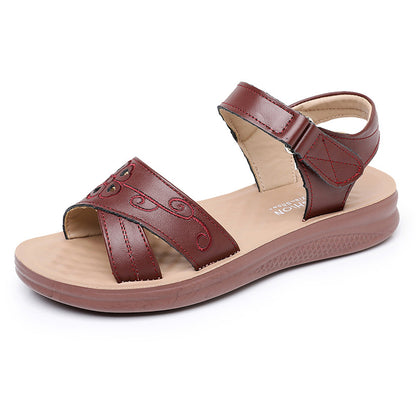 Sandalias planas de cuero para mujer