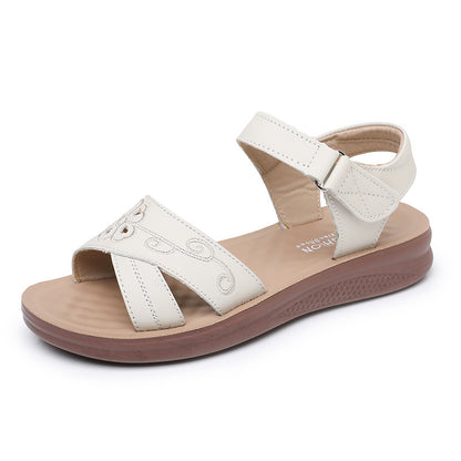 Sandalias planas de cuero para mujer